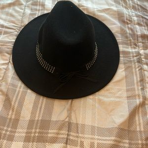 Black brim hat with  silver embellishment